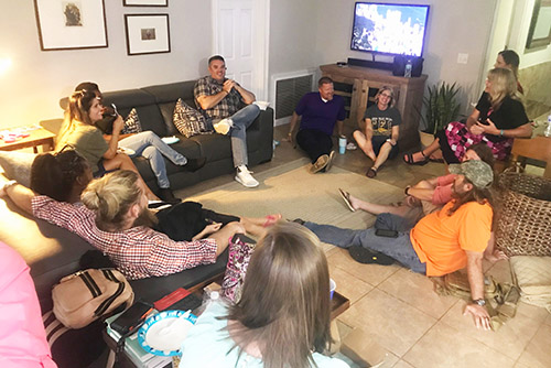 A life group gathered in a living room